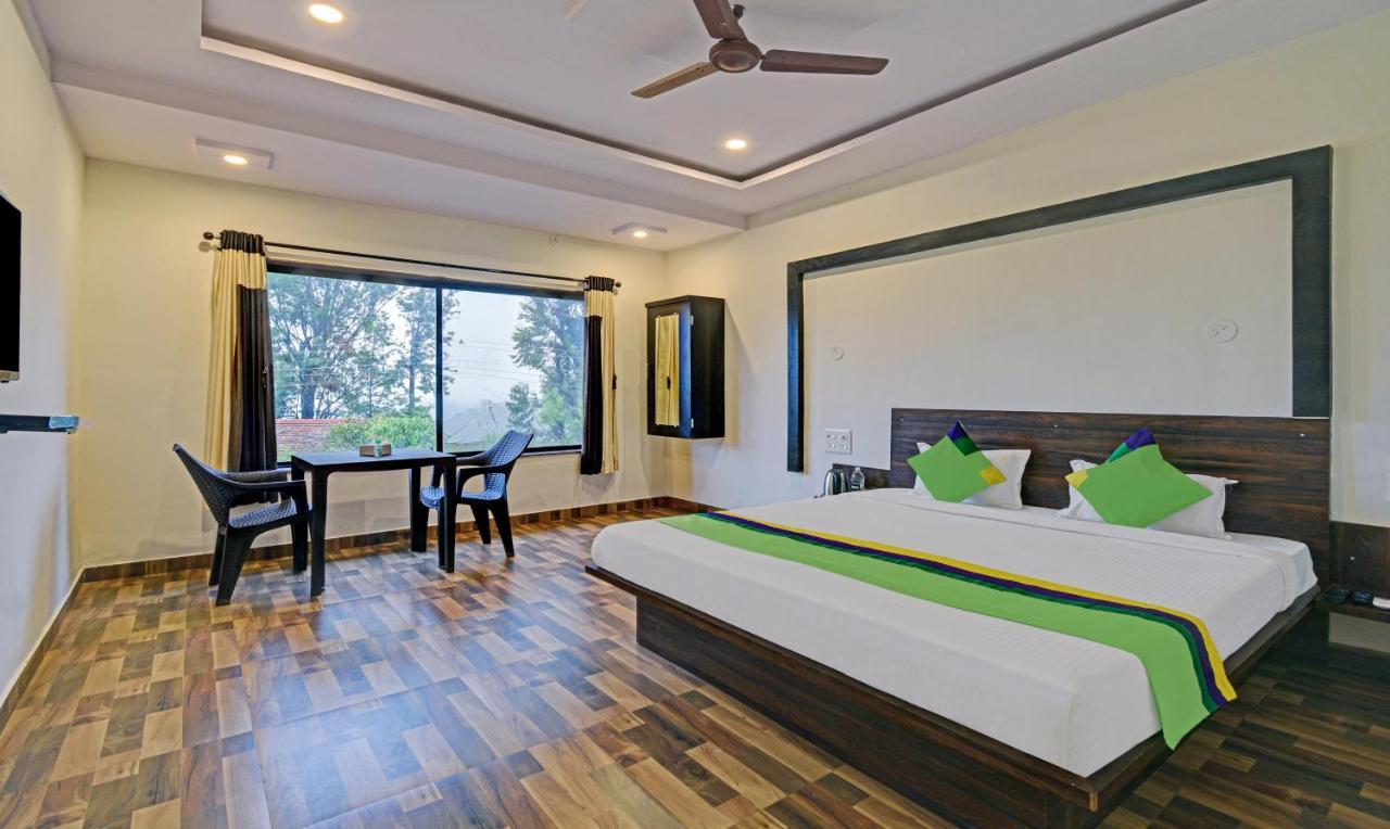 Treebo Paradise Inn With Mountain View Hotel 3*
